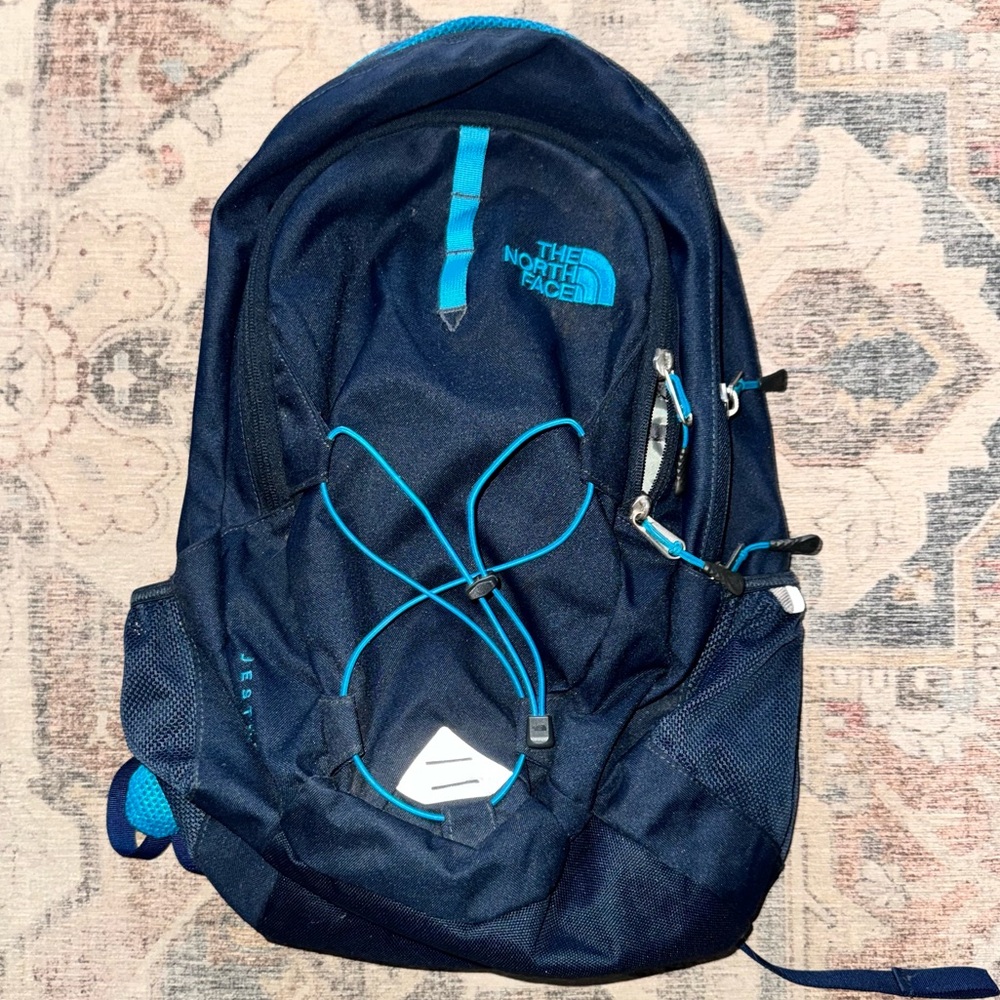 The North Face Dark Blue Backpack with Teal Accents